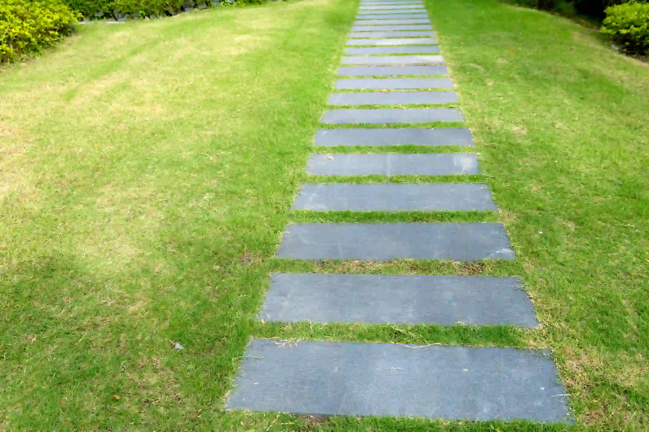Creating Safe Walkways with Consistent Lawn Mowing Midland, MI